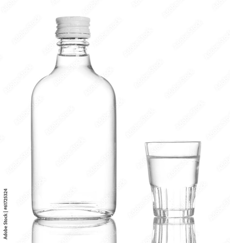 Bottle of vodka and wineglass isolated on white Bottle of vodka and wineglass isolated on white