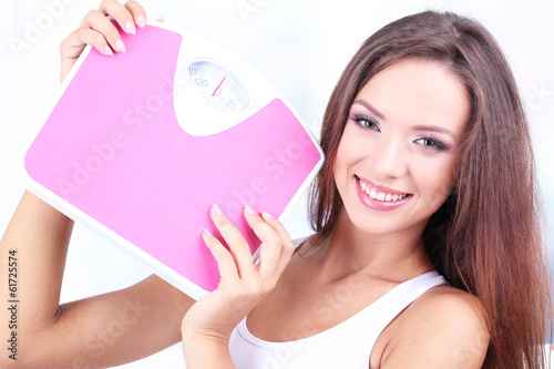 Beautiful young woman with ...