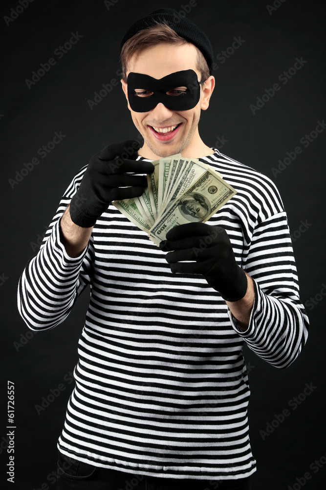Obraz premium Thief isolated on black