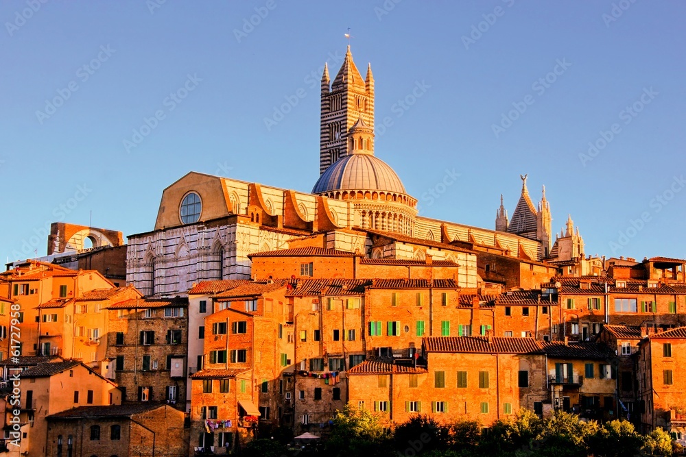 View over the medieval city of Siena, Italy at sunset