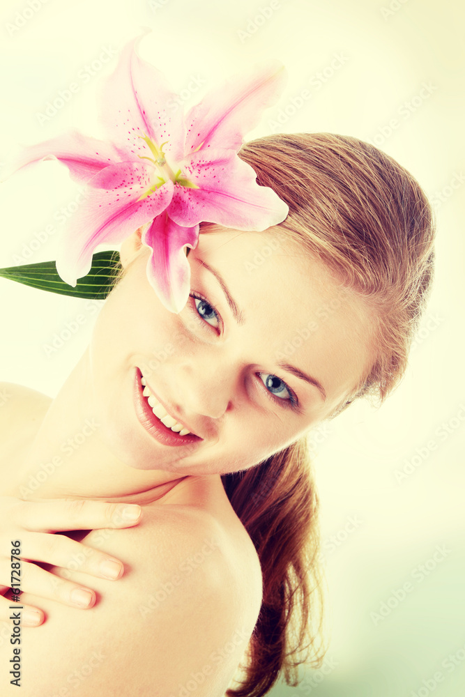 Beautiful blond woman with lily flower Beautiful blond woman with lily flower