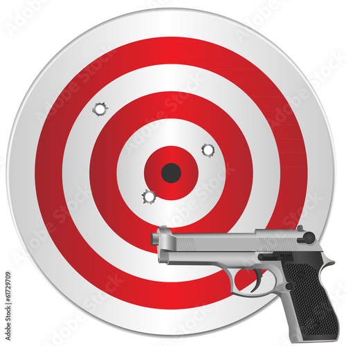 gun and target with bullets holes