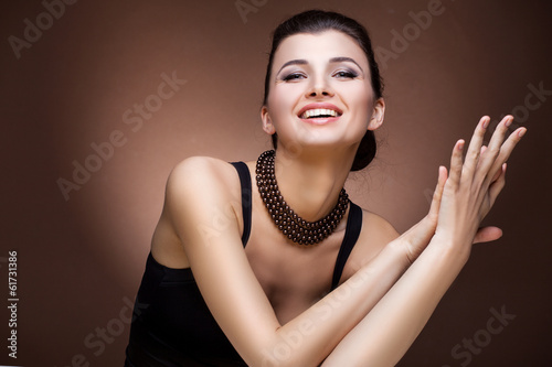 Portrait of luxury woman in exclusive jewelry photo