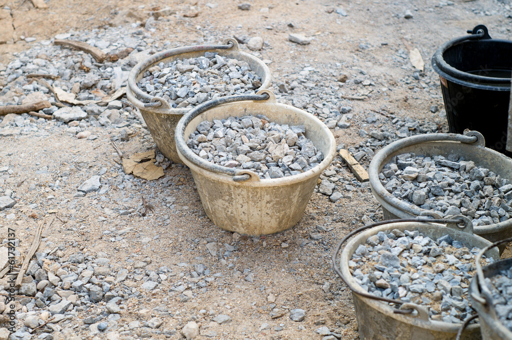 raw material for construction, stone and pail raw material for construction, stone and pail
