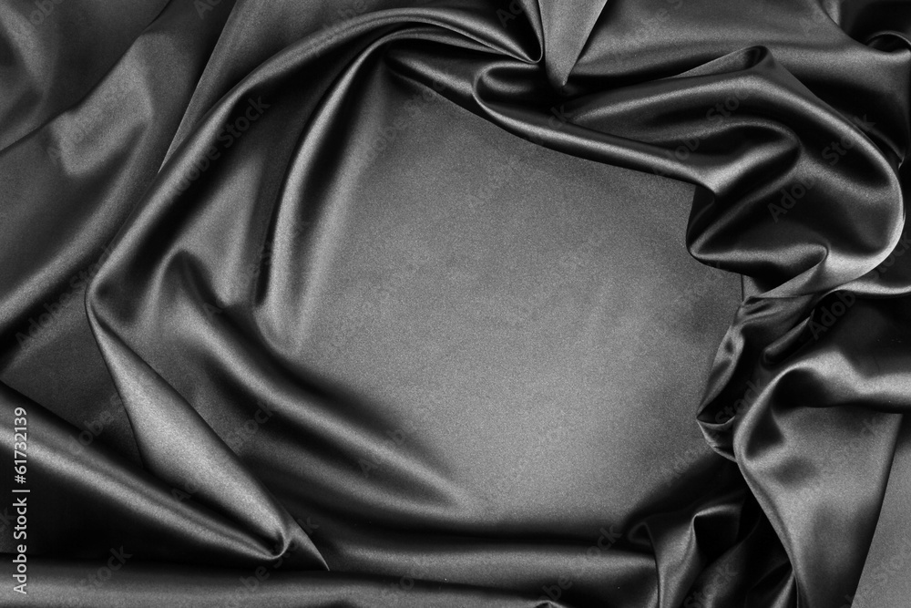 Black or gray silk fabric material background. Copy space