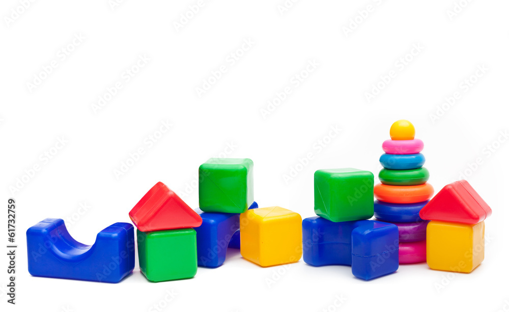 Toys isolated on white background. Pyramid build from colored Toys isolated on white background. Pyramid build from colored