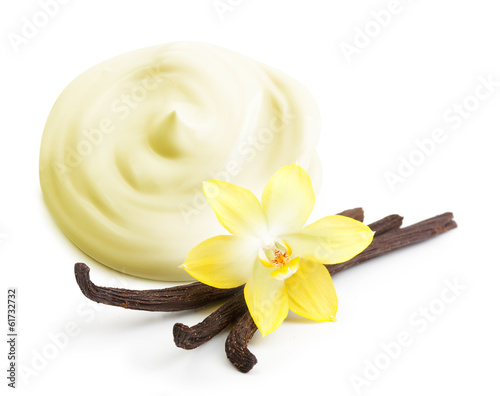 Cream,vanilla pods and orhid flower isolated on white