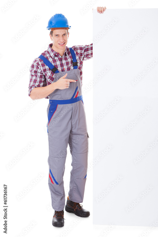 Young Male Worker Holding Placard