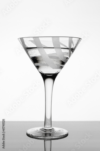 Glass goblet with water.