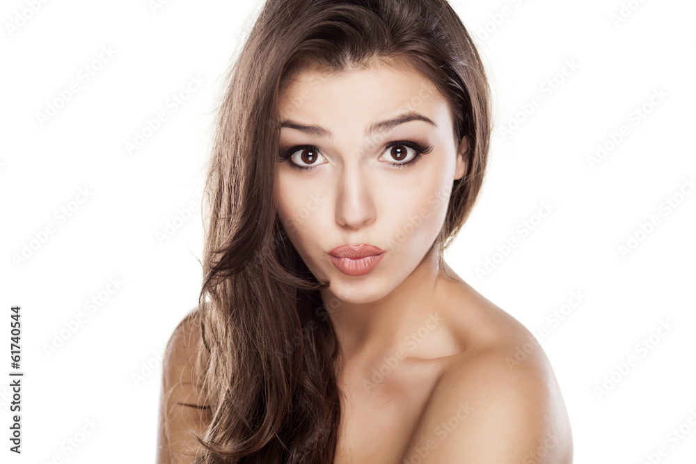Young beautiful woman with kissing gesture Young beautiful woman with kissing gesture