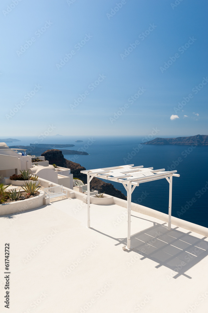 Terrace with Sunshade on Santorini Greece - obrazy, fototapety, plakaty 