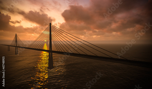 Suspension bridge on sunset