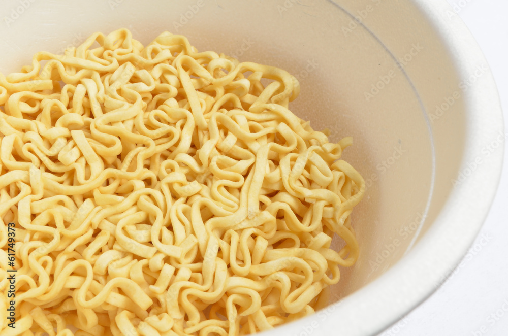 Dry instant noodle in a bowl Dry instant noodle in a bowl