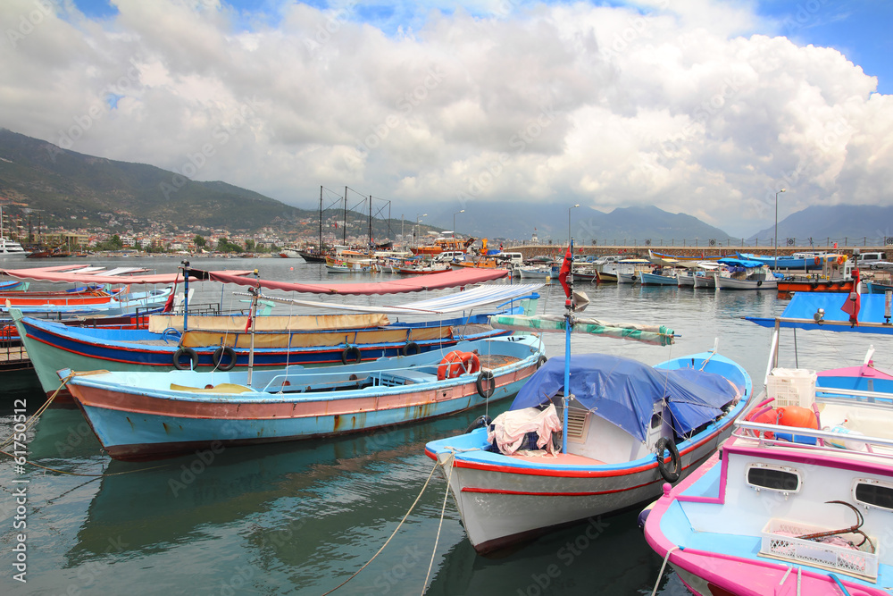 boats stand at the pier in Alanya