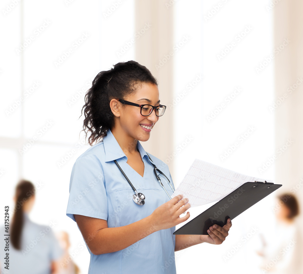 smiling female african american doctor or nurse smiling female african american doctor or nurse