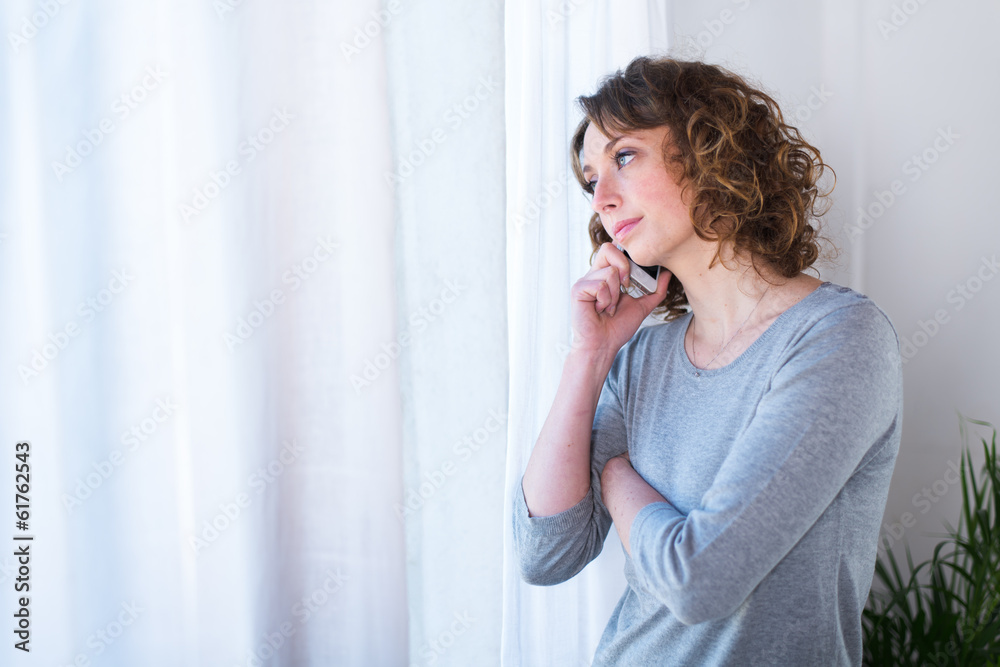 beautiful young woman having telephone conversation beautiful young woman having telephone conversation