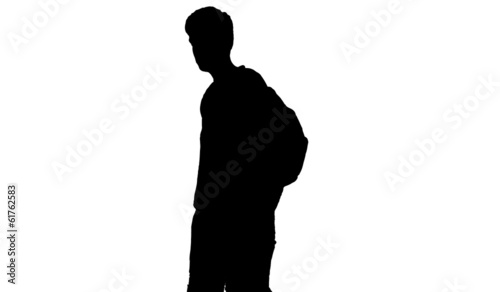 Black standing man silhouette with backpack