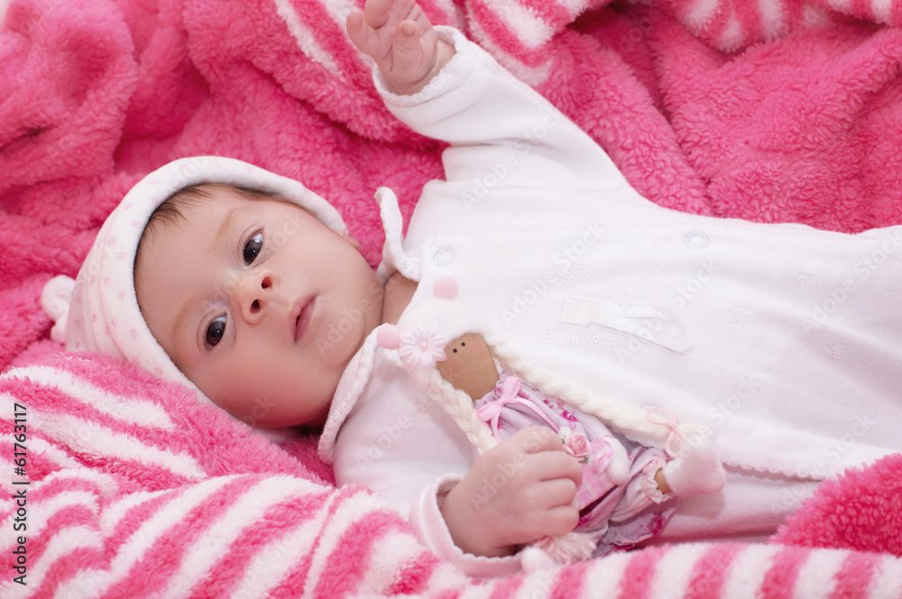 Beautiful baby girl in pink