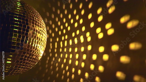 Gold disco ball effect and reflection on the wall, loop-ready