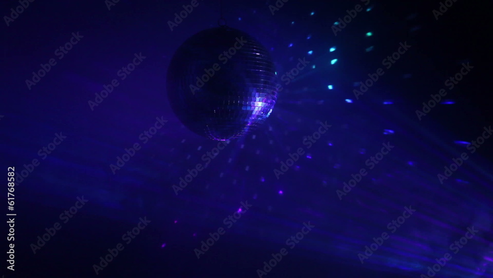 Rotating disco ball with multicolor light effect and dense smoke