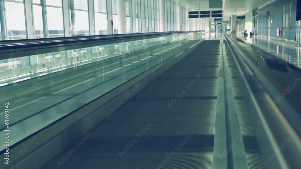 Camera moving on flat escalator at airport, HD 1080p Camera moving on flat escalator at airport, HD 1080p