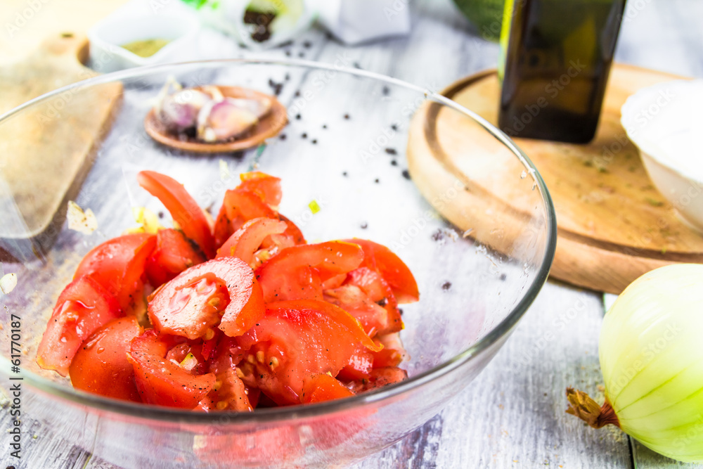 Freshly chopped tomatoes glass dish Freshly chopped tomatoes glass dish