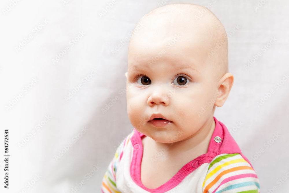 Little brown eyed Caucasian baby girl closeup studio portrait Little brown eyed Caucasian baby girl closeup studio portrait