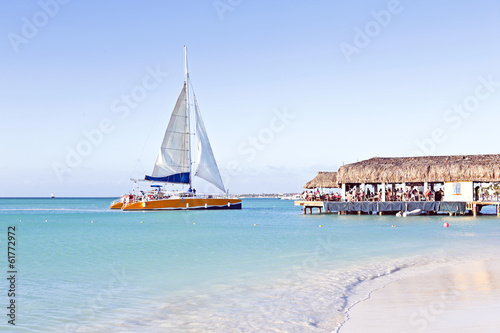 Sailing in the blue caribic sea photo