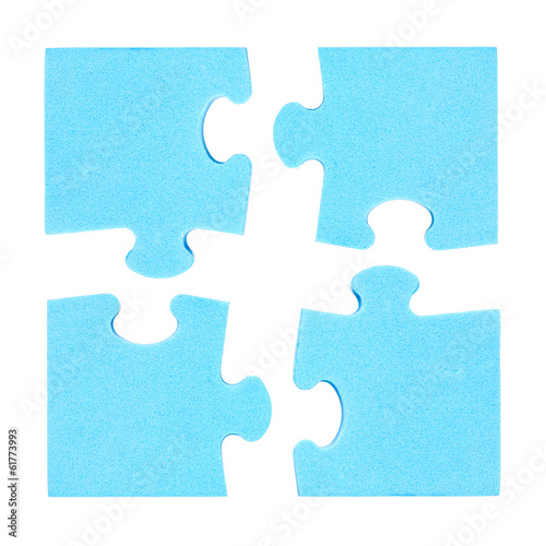 Four  puzzle pieces combined cooperation concept