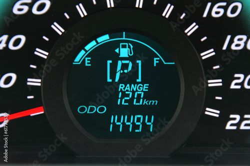 Close-up of a digital car fuel gauge photo