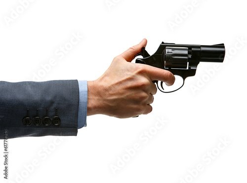 Tablou pe pânză Male hand cocking revolver gun