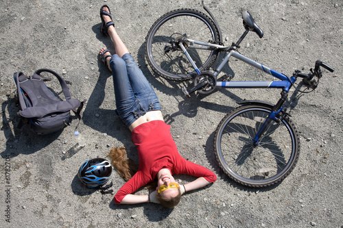 woman  cyclist rest near bike