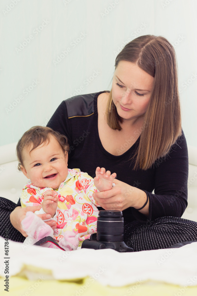 Happy mother and daughter are playing together Happy mother and daughter are playing together