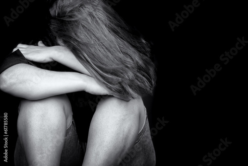 Young woman crying depression violence