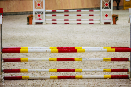 Obstacle for jumping horses. Riding competition.