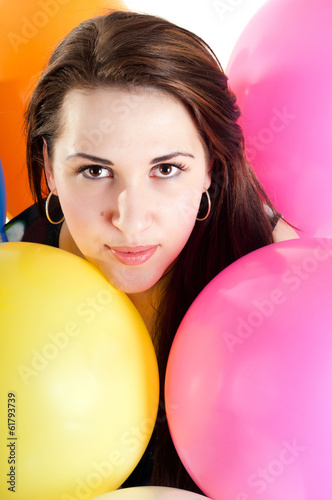 Beautiful female with multicolored air balloons