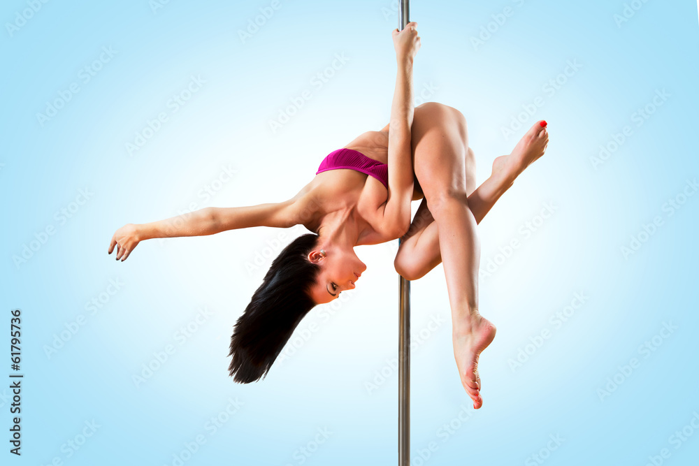 Young pole dance woman. Bright blue colors.