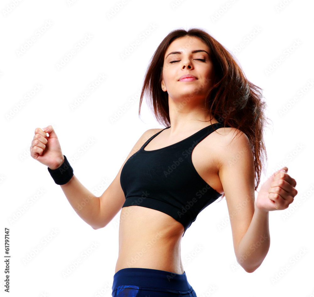 Young happy sport woman dancing isolated on white Young happy sport woman dancing isolated on white