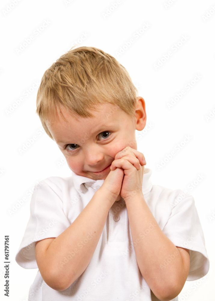 Cute blond boy posing for a portrait Cute blond boy posing for a portrait