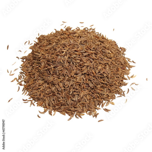 Pile spice cumin in grain isolated on white background