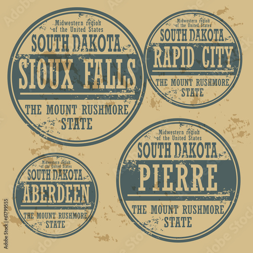 Grunge rubber stamp set with names of South Dakota cities