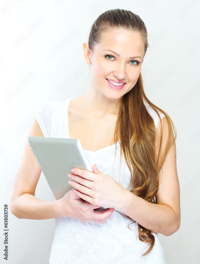 young woman holding tablet computer young woman holding tablet computer