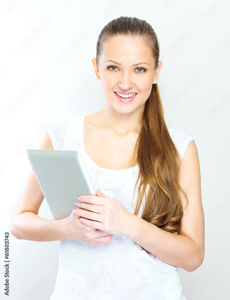 young woman holding tablet computer young woman holding tablet computer