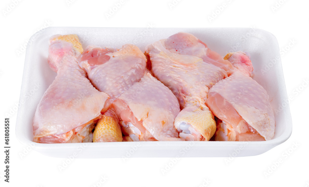 Fresh chicken legs isolated on a white