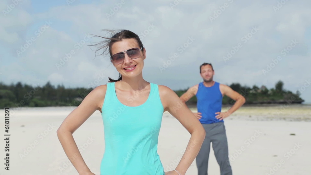 Portrait of young attractive woman, jogger on the beach Portrait of young attractive woman, jogger on the beach