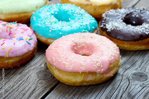 Donuts on a wooden background