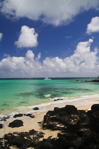 Tropical beach with boats