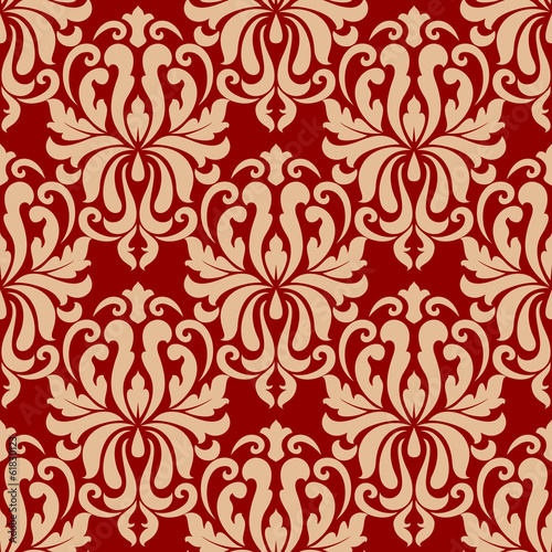 Ornate arabesque repeat pattern on red