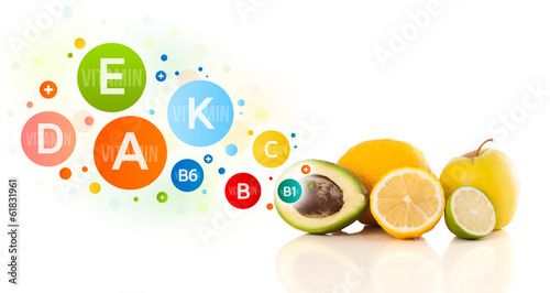 Healthy fruits with colorful vitamin symbols and icons