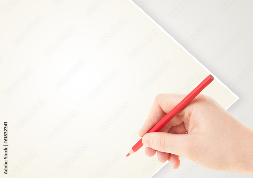 Human hand drawing with pencil on empty paper template Human hand drawing with pencil on empty paper template